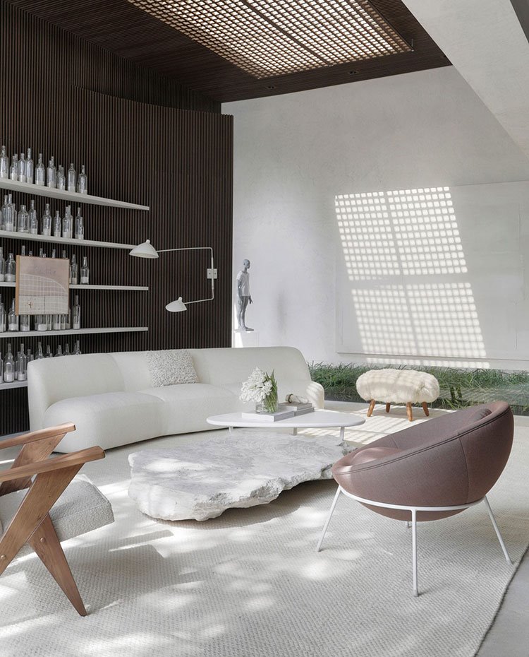 Salón con sofá blanco y butaca morada, estantería con botellas y pared alistonada, alfombra blanca y techo con lucernario y pantalla perforada
